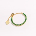 Close-up of adjustable gold chain ring with green zircon stones and heart charm - Adjustable Open / Green Zircon - Gold