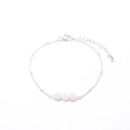 Minimalist silver beaded bracelet featuring three soft pink quartz stones and lobster clasp - Rose Quartz
