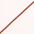 Macro detail of red cubic zirconia bracelet with gold claw setting on white background - Red Zircon - Gold