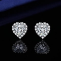 Sparkling S925 silver heart stud earrings with halo cubic zirconia on a black surface - Heart-shaped Earrings Tz-2