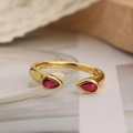 Detailed close-up of golden drop-shaped open ring featuring vibrant red pear-cut stones - 13772-Double Head Water Drop/Ruby Red