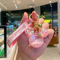 Pink Mickey-shaped astronaut floating liquid keychain with pink silicone wrist strap - Mickey Head Shaker - Pink