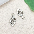 Pair of silver-tone hollow leaf charms for DIY bracelets with detailed vein texture - Hollow Leaf / 9x20mm