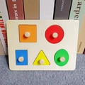 Close-up of wooden Montessori puzzle with colorful geometric shapes and knobs for toddlers - 5-Hole Square Strip 20*15*2cm