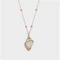 Gold-plated natural conch shell pendant necklace with delicate beaded chain for beach wear - Gold-Edged Conch