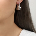 Polished silver layered wave hoop earrings with a modern geometric bag-style design - Silver Earrings