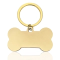 Polished gold bone-shaped pet ID tag with a metallic ring on a white background - Small Gold Bone Pendant Keychain