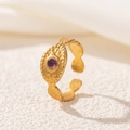 Macro detail of 18K gold ring featuring a purple stone and hand-hammered texture - Hammered Purple Stone Style (2549-14)