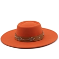 Detail of orange wool fedora featuring a brown leather band with silver metal studs - M / Orange