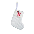 White cable-knit Christmas stocking featuring a red embroidered letter K with Santa hat - White-Letter K