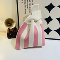 Pink and beige striped knitted knot bag with a soft woven texture and handle - Striped Rice