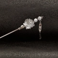 Macro detail of ancient style hair stick with translucent white flower and beaded tassel - Style 4 Butterfly Water Drop