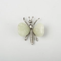 Silver butterfly ornament with light green heart-shaped crystal wings in a creative design - Xiu Jade