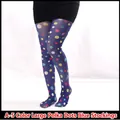 Detail of dark blue sheer tights featuring large colorful polka dot prints on a model - A-5 Colorful Large Polka Dot Blue Sock