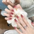 Detail of long coffin nails with red gradient design and delicate cherry accents - By1511 Liu Yao Tao Yan / Glue Type
