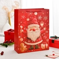 Grande sacchetto regalo di Natale rosso con Babbo Natale, pan di zenzero e fiocchi - Babbo Natale Felice / Medio (12 pezzi)