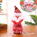 Christmas Santa knit drawstring gift bag with reindeer pattern and pompom hat - Knitted Santa Bag
