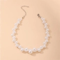 Detail of woven faux pearl choker with silver adjustable lobster clasp and chain - White Pearl Style