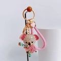 Cute koala keychain with pink rhinestones and braided strap on a white stand - Pink with Heart Lanyard / Pink