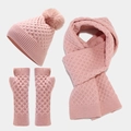Detailed knit texture of dusty pink winter set with pompom hat, scarf, and fingerless gloves - Pink