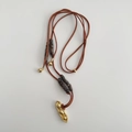 Detail of leather cord necklace featuring a gold pea pod pendant and silk thread accents - 95# Necklace (95#) / Coffee-Gold