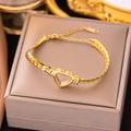 Gold Hollow Heart Charm Bracelet