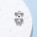 Detail of silver bear pendant featuring micro-pave rhinestones and two white pearls - Pearl Bear / Silver