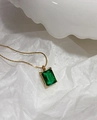 Detail shot of emerald-cut green zircon necklace set in 18k gold-plated titanium steel - Square Zirconia Necklace / Green