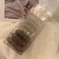 Spiral telephone wire hair ties in gray and transparent white set in a clear gift box - 9Pcs【Boxed】 / Gradient Grey