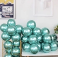 Mint green chrome latex balloon with metallic finish displayed in a gold basket - Metallic Green - Small