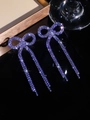 Sparkling purple rhinestone bow long tassel earrings with shimmering crystals - Stud Earrings / Violet