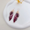 Deep purple butterfly wing earrings with sequins and rhinestones on a ceramic plate - Noble Purple Rhinestone-Rose Gold