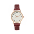 Close-up of rose gold watch with white dial and burgundy mesh magnetic strap - Red