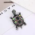 Vintage zilveren schildpadbroche met groene kristallen en kleurrijke strass-steentjes - Zilver