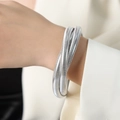 Bracciale tubogas in argento con triplo strato intrecciato e trama metallica - Acciaio Sottile