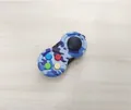 Blue camouflage fidget pad toy with analog joystick and four colorful buttons - Navy Blue Camouflage with Color Box and String