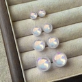 Iridescent white mermaid pearl stud earrings set in four different gradient sizes - Half-round Studs-8mm