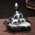 Ceramic backflow incense burner in black mountain design with flowing smoke waterfall - Lotus Rhyme