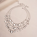 Detail of a three-layer silver necklace with hammered coin pendants on a beige background - Silver (3-Piece Set)