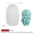 Devil skull silicone mold for DIY candles showing product dimensions and green resin finish - Demon Skull (Jack Skellington)