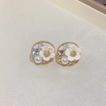Macro detail of gold weave earring with white flower, pearl and blue crystals - Gold Woven Round Frame Flower Pearl Earrings (17#)