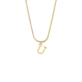 Detailed view of capital letter U gold pendant on a minimalist snake chain necklace - Style U