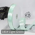 Light green polyester satin ribbon roll 141# on white spool for gift wrapping decoration - 91m / 141# Light Green
