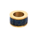 Macro view of gold-plated cylinder bead with emerald-cut dark blue zircon stones - Blue Ring