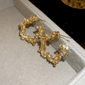 Macro shot of gold C-shaped earrings with shimmering crystals on grey velvet - 17# Full Rhinestone C-shape Style