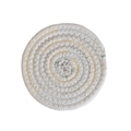 Macro detail of round woven cotton coaster with colorful zigzag stitching and texture - White Rice Cold Color