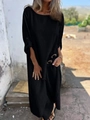 Detail of loose black long dress with round neck and metal buckle on breathable fabric - S / Black