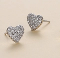 Elegant heart-shaped stud earrings in silver finish with pavé set cubic zirconia - Silver