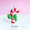 Detailed view of candy cane resin pendant with red white stripes and green bow for DIY - Style 1-Red and White Candy Cane