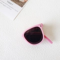 Pink foldable kids sunglasses with dark lenses and stylish metal hinge details - Pink
